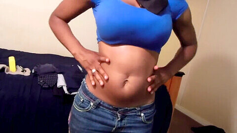 Ebony navel, ebony ripped jeans, ebony belly