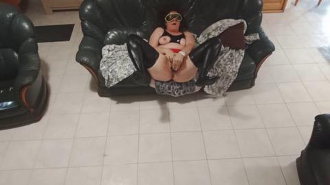 Black latex, cougar, nipple piercing Black latex, cougar, nipple piercing